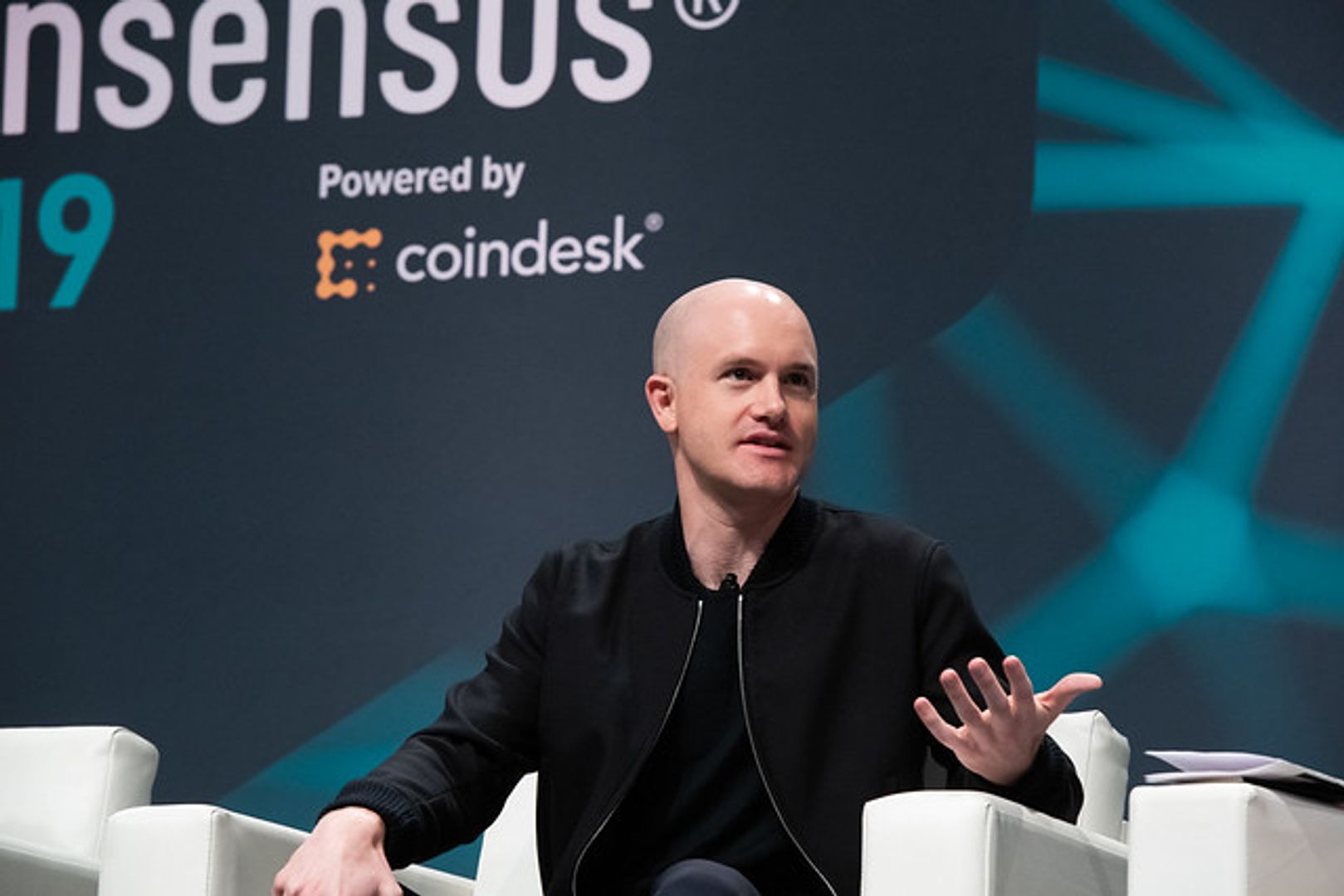 Coinbase CEO Brian Armstrong criticizes crypto startups that rebrand to AI